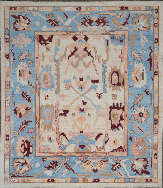 Ivory and blue vintage Turkish Oushak hand-knotted wool rug 8x10 burgundy floral accents classic traditional full view