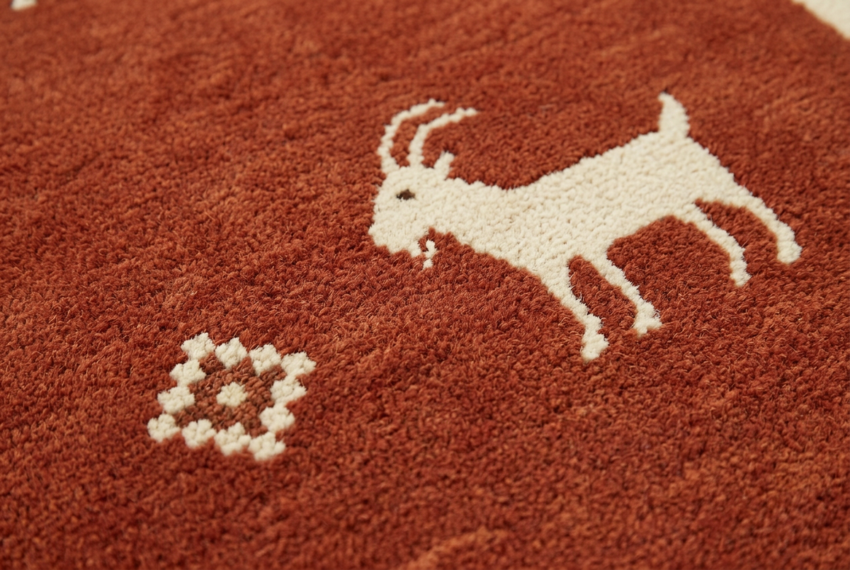 Desert Caravan motif and wool detail